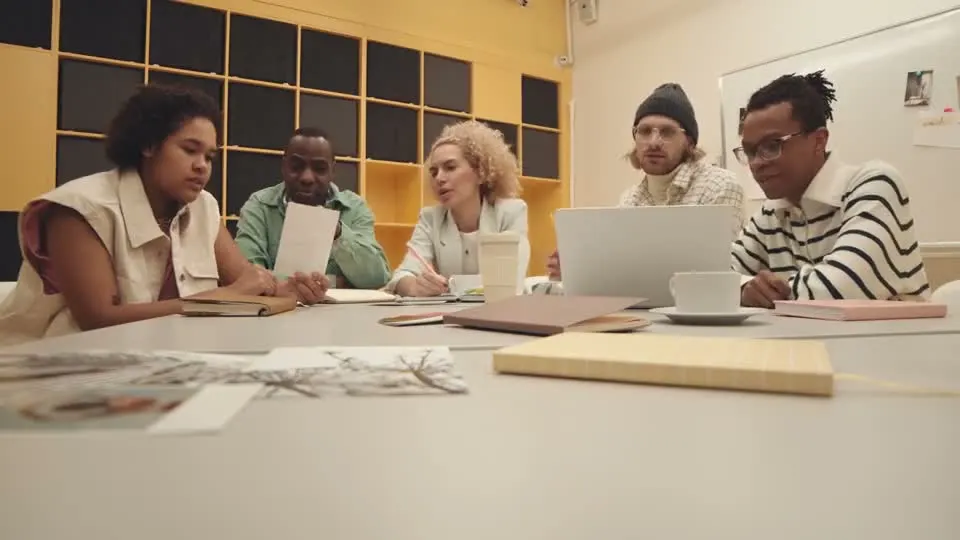 People sharing ideas in a group discussion