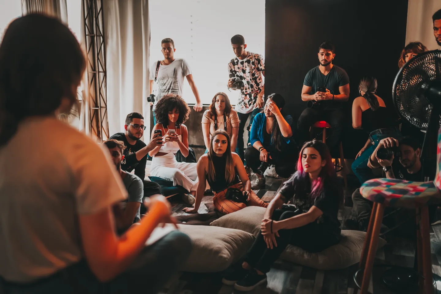 People sharing ideas in a group discussion