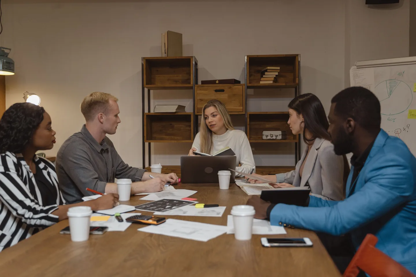 People sharing ideas in a group discussion